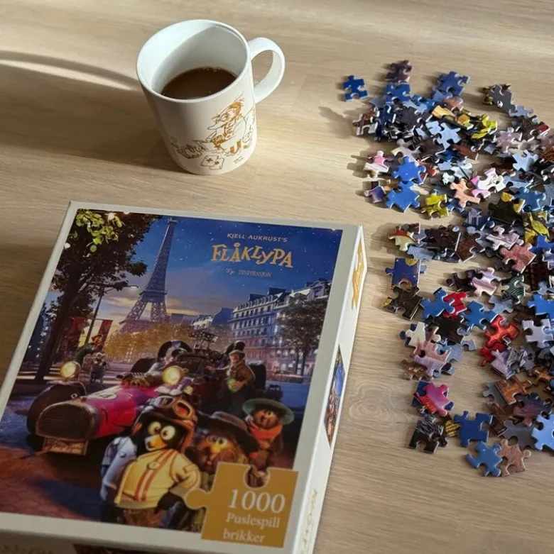 Puslespill 1000 brikker Fra Paris til Pyramidene